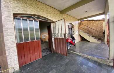 Imagem: A casa possui 2 Dormitórios, 2 Banheiros, 1 Vaga na garagem