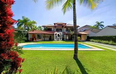 Imagem: A casa em condomínio possui 5 Dormitórios, 5 Banheiros, 5