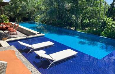 Imagem: A casa em condomínio possui 5 Dormitórios, 5 Banheiros, 3