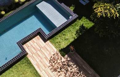 Imagem: A casa em condomínio possui 4 Dormitórios, 3 Banheiros, 4