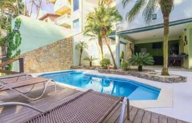 Imagem: A casa possui 5 Dormitórios, 5 Banheiros, 4 Vagas na garagem