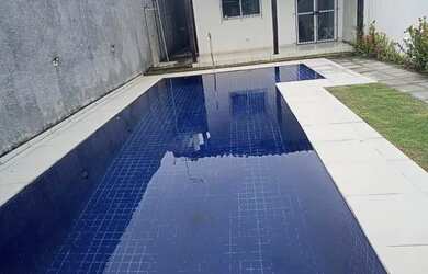 Imagem: A casa possui 3 Dormitórios, 2 Banheiros, 3 Vagas na garagem