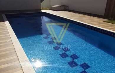 Imagem: A casa em condomínio possui 4 Dormitórios, 4 Banheiros, 5