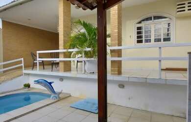 Imagem: A casa possui 4 Dormitórios, 4 Banheiros, 4 Vagas na garagem