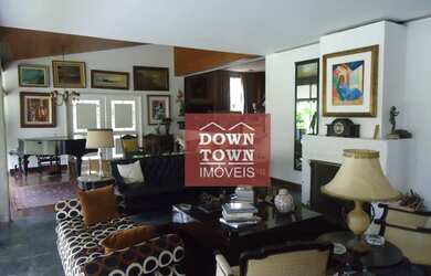 Imagem: A casa em condomínio possui 4 Dormitórios, 5 Banheiros, 5