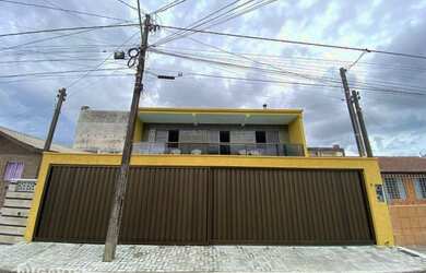 Imagem: A casa possui 3 Dormitórios, 2 Banheiros, 4 Vagas na garagem