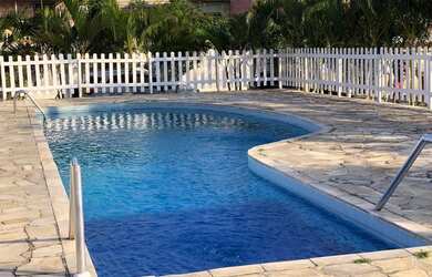 Imagem: A casa possui 2 Dormitórios, 1 Vaga na garagem e está localizado