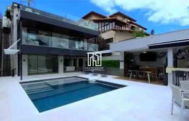 Imagem: A casa em condomínio possui 4 Dormitórios, 5 Banheiros, 2