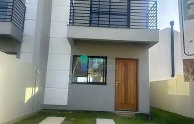 Imagem: A casa possui 3 Dormitórios, 1 Banheiro, 2 Vagas na garagem