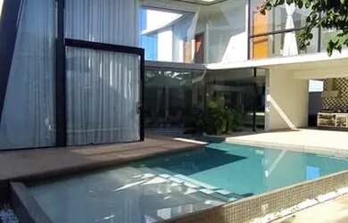 Imagem: A casa em condomínio à venda possui 4 Dormitórios, 5 Banheiros