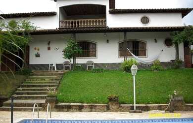 Imagem: A casa possui 3 Dormitórios, 4 Banheiros, 3 Vagas na garagem