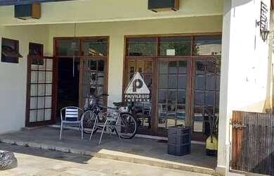 Imagem: A casa em condomínio possui 4 Dormitórios, 4 Banheiros, 2