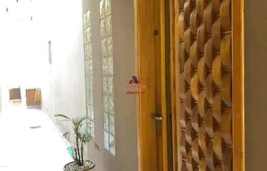 Imagem: A casa possui 3 Dormitórios, 3 Banheiros, 4 Vagas na garagem