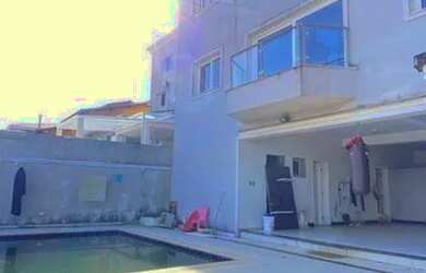 Imagem: A casa em condomínio possui 4 Dormitórios, 5 Banheiros, 5