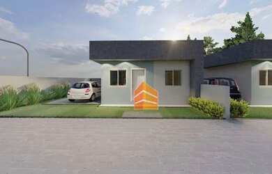 Imagem: A casa possui 2 Dormitórios, 1 Banheiro, 2 Vagas na garagem