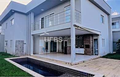 Imagem: A casa possui 5 Dormitórios, 5 Banheiros, 4 Vagas na garagem