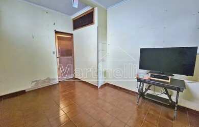 Imagem: A casa possui 3 Dormitórios, 2 Banheiros, 3 Vagas na garagem