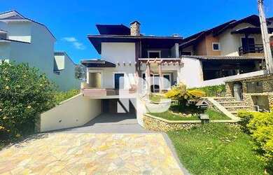 Imagem: A casa em condomínio possui 4 Dormitórios, 5 Banheiros, 4