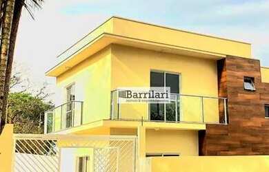 Imagem: A casa possui 2 Dormitórios, 3 Banheiros, 2 Vagas na garagem