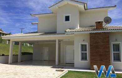 Imagem: A casa em condomínio possui 4 Dormitórios, 5 Banheiros, 5