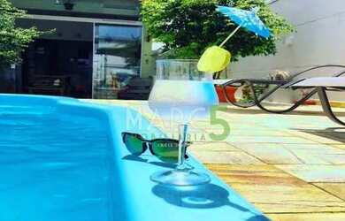 Imagem: A casa possui 3 Dormitórios, 4 Banheiros, 2 Vagas na garagem