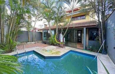 Imagem: A casa possui 3 Dormitórios, 3 Banheiros, 3 Vagas na garagem