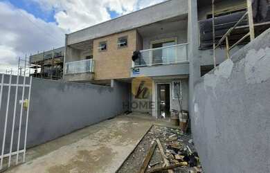 Imagem: A casa possui 2 Dormitórios, 3 Banheiros, 2 Vagas na garagem