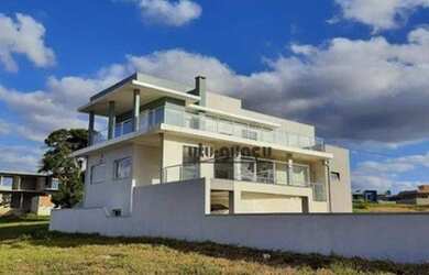 Imagem: A casa em condomínio possui 3 Dormitórios, 4 Banheiros, 2