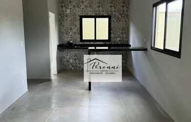 Imagem: A casa possui 3 Dormitórios, 2 Banheiros, 2 Vagas na garagem