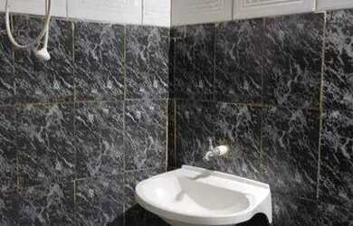 Imagem: A casa possui 2 Dormitórios, 1 Banheiro, 1 Vaga na garagem