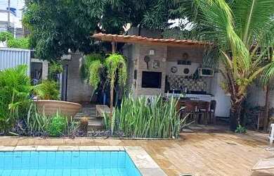 Imagem: A casa possui 3 Dormitórios, 4 Banheiros, 4 Vagas na garagem