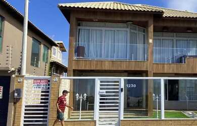 Imagem: O quarto possui 1 Dormitório e está localizado em Praia do