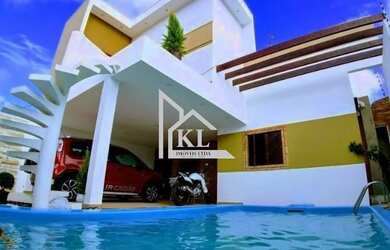 Imagem: A casa possui 3 Dormitórios, 4 Banheiros, 2 Vagas na garagem