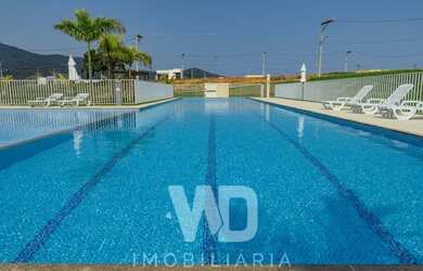 Imagem 2: Lote em condomínio PARCELADOS, possui 240 metros quadrados em Maricá...