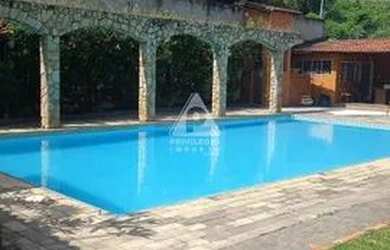 Imagem: A casa em condomínio possui 5 Dormitórios, 5 Banheiros, 5