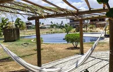 Imagem: A casa em condomínio possui 3 Dormitórios, 4 Banheiros, 2