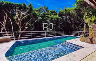 Imagem: A casa em condomínio possui 5 Dormitórios, 5 Banheiros, 4