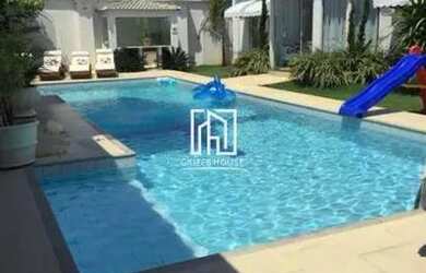 Imagem: A casa em condomínio para alugar possui 4 Dormitórios, 5 Banheiros