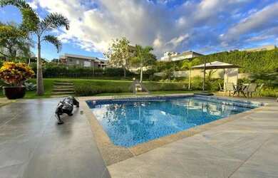 Imagem: A casa em condomínio possui 4 Dormitórios, 4 Banheiros, 3