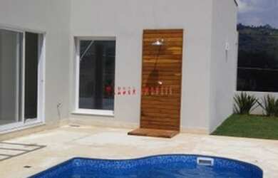 Imagem: A casa em condomínio possui 3 Dormitórios, 4 Banheiros, 3