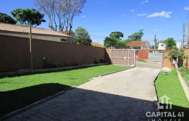 Imagem: A casa possui 4 Dormitórios, 3 Banheiros, 5 Vagas na garagem