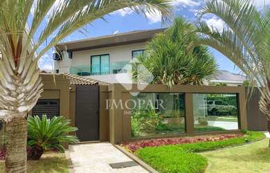 Imagem: A casa em condomínio possui 4 Dormitórios, 5 Banheiros, 3