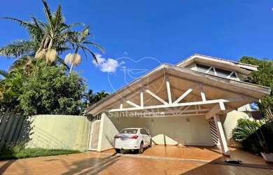 Imagem: A casa possui 5 Dormitórios, 3 Banheiros, 5 Vagas na garagem