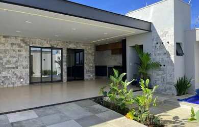 Imagem: A casa possui 3 Dormitórios, 4 Banheiros, 4 Vagas na garagem