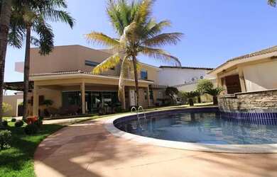 Imagem: A casa possui 4 Dormitórios, 5 Banheiros, 5 Vagas na garagem