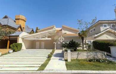 Imagem: A casa em condomínio possui 4 Dormitórios, 5 Banheiros, 5