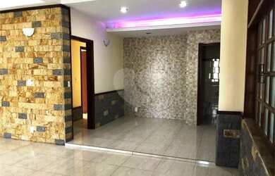 Imagem: A casa possui 5 Dormitórios, 3 Banheiros, 5 Vagas na garagem