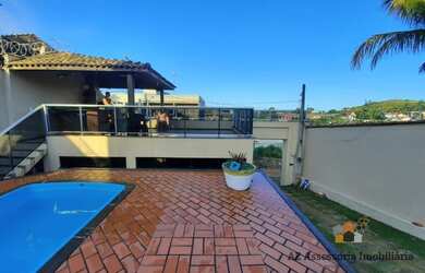 Imagem: A casa possui 5 Dormitórios, 4 Banheiros, 5 Vagas na garagem