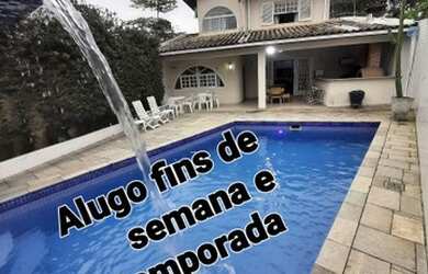 Imagem: A casa possui 4 Dormitórios, 3 Vagas na garagem e está localizado