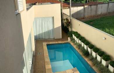 Imagem 4: Casa de condomínio para venda tem 350 metros quadrados com 4 quartos